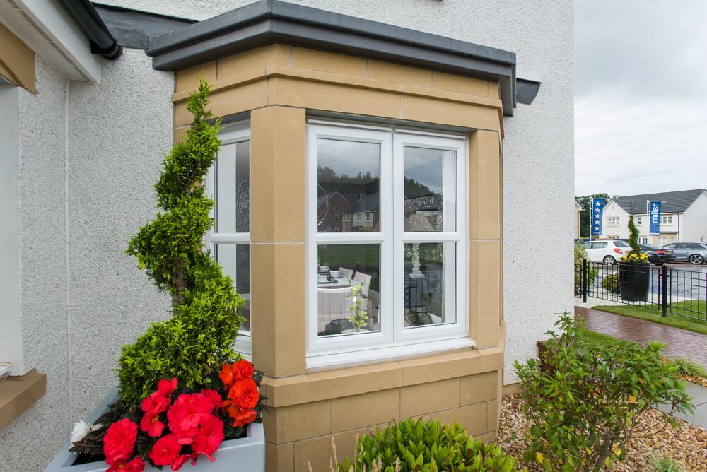 How to Stop Condensation on Windows This Winter 3 White uPVC casement windows on a home in Scotland